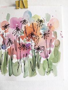 an art project with flowers painted on paper