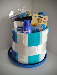 a blue and white striped basket filled with personal care items