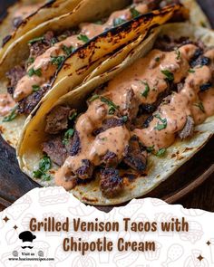 grilled venison tacos with chipotle cream on a wooden plate