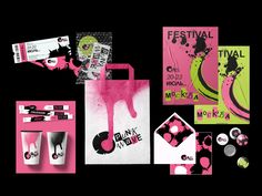 various items are displayed on a black background with pink and green paint splatters