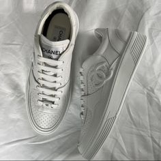 Chanel White Sneakers, Similar To Air Force 1. I'm Usually Eu 38 (Ggdb), But Chanel Runs 1/2 Small So These Are 38.5 Luxury Calf Leather Sneakers For Streetwear, Luxury Streetwear Sneakers With Round Toe, Luxury Round Toe Sneakers For Streetwear, Designer Low-top Sneakers With Laces, Luxury Low-top Sneakers With Laces, White Luxury Low-top Sneakers, Designer Calf Leather Sneakers For Streetwear, Luxury Custom Low-top Sneakers With Laces, Luxury High-top Calf Leather Sneakers