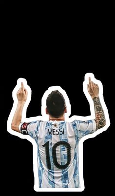 a man with his hands up in the air and wearing a shirt that says messi