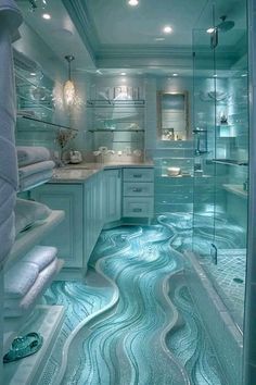 a bathroom with blue water flowing down the floor