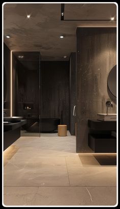 a large bathroom with black fixtures and marble flooring