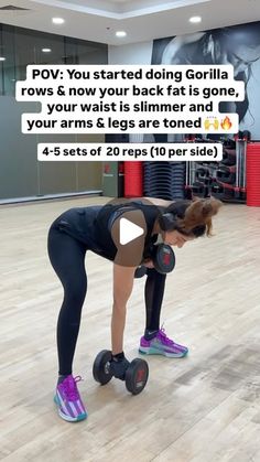 a woman is doing push ups on rollers