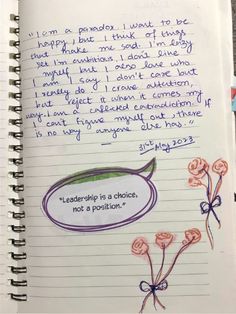 an open notebook with some writing on it