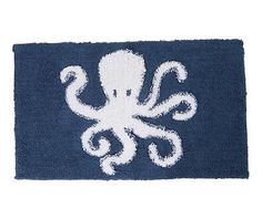 an octopus rug on a white background