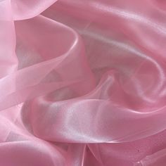 Baby Pink Crystal Organza Fabric by the yard, bulk or wholesale.  Delicately sheer, lightweight, and incredibly soft to the touch, it's the ideal choice for a wide range of projects. Our Light Pink organza fabric is perfect for creating exquisite garments and decorations.  Crafted from 100% polyester, this lightweight fabric offers a sheer and crisp drape, providing strength and elegance in every project. Whether you're designing ball gowns, wedding dresses, blouses, scarves, bridal apparel or fabric roses, organza is the ideal choice for achieving voluminous and structural effects. This baby pink organza fabric is also perfect for event decorations. Whether it's baby shower decor or wedding decorations, the sheer beauty of this organza fabric adds a captivating touch to any setting.  Prod Aesthetic Project, Bridal Apparel, Lotus Lake, Pink Widget, Dragonfly Painting, Pinterest Contest, Glossier Pink, Fashion Crafts, Event Decorations