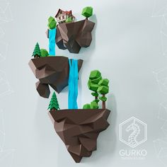 two paper sculptures with trees and a house on top of a rock formation that is floating in the water