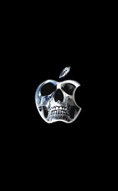 an apple skull is shown in the dark