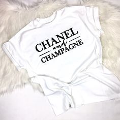 Black Or White T Shirt With White Lettering, Relaxed Fit. Sleeves Are Standard And Can Be Rolled Up, Cute For Layering And Leggings Classy Graphic Tee Outfit, Champagne Graphic, Chanel Pin, Graphic Tshirt Outfit, Chanel T Shirt, Altered Clothes, Classy Lifestyle, Designer Tees, Marathon Shirts