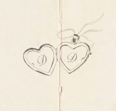 two hearts with the letter d on them are drawn in pencil and placed next to each other