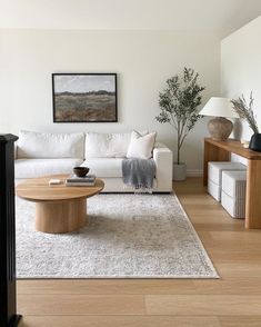 the living room is clean and ready to be used as an office or family room