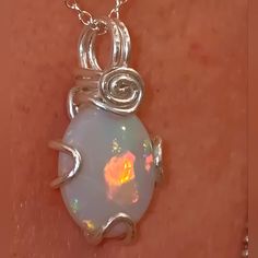 Selling This Beautiful In All Colors Bursting Australian Opal Pendant. The Opal Is Set In Full Sterling Silver Wire. Comes With A 16 Inch Sterling Silver Chain. I Edged Dremelt And Polished It Myself And Made The Pendant. It Has Some Potch / Hair Lines In It Wich You Can See In The Video And Pictures. New. Does Not Have Tags Because I Made It By Hand. So Much More Beautiful In Person. Hard To Capture In Pictures And Video. Non Smoking And Animal Free Household. Offers Are Welcome. Opal Necklace Pendant, Australian Opal Pendant, Opal Pendant Necklace, Australian Opal, Women Artisans, I Made It, Opal Pendants, Opal Necklace, Sterling Silver Chain