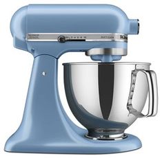 an image of a blue kitchen mixer on a white background with clippings to the side