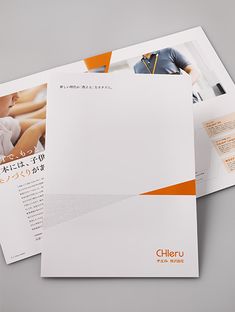 the brochure is designed to look like it has an orange stripe on it