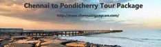 an image of a pier that is next to the ocean with clouds in the sky