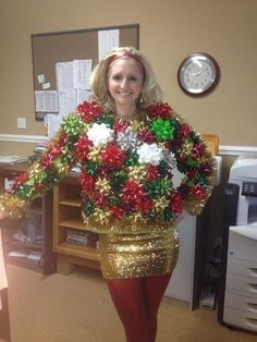 a woman in a christmas sweater and red tights