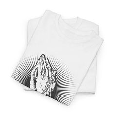 a white t - shirt with an image of a praying hand on the front and back