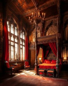 an ornate bedroom with red bedding, chandelier and curtains on the windows