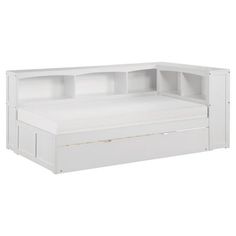 a white bed frame with drawers on the top and bottom shelf above it, in front of a white background