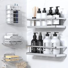 bathroom shelves with soaps, lotions and other personal care products on them in a white tiled room