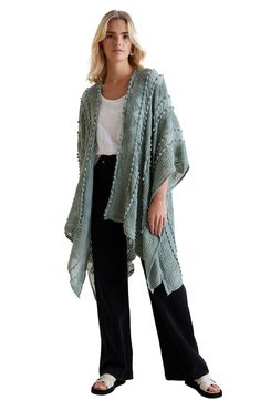 Easily layer this woven duster over any outfit that needs a pop of boho flair, complete with tonal pompoms and raised stitching. 38" length (size OS) No collar 3/4 length sleeves Open front 100% polyester Hand wash Imported Model stats: 5'10" height, 32" bust, 25" waist, 36" hip. Model is wearing size OS. One Size Spring Poncho With Tassels, Spring Poncho One Size With Tassels, Spring Poncho With Tassels One Size, Spring Poncho With Tassels, One Size Tassel Poncho For Spring, Casual Spring Poncho With Tassels, Bohemian Spring Poncho With Tassels, Sage Color, Womens Kimono