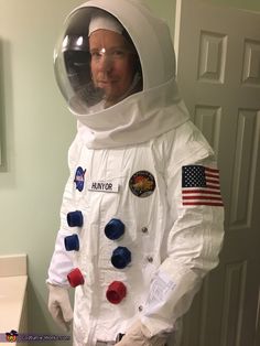 a man dressed in an astronaut costume