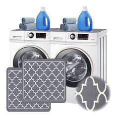 two washers and one dryer sitting next to each other in front of a white background