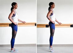 a woman standing in front of a wooden rail with her hands behind her back and the bottom half of her body