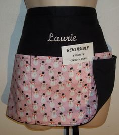 a woman's skirt with a snowman print on it and the name laurie reversible