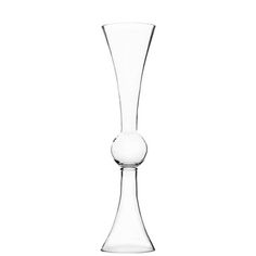 a tall glass vase sitting on top of a table