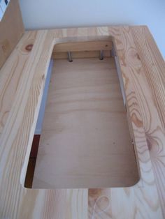 a wooden table with a hole in the middle