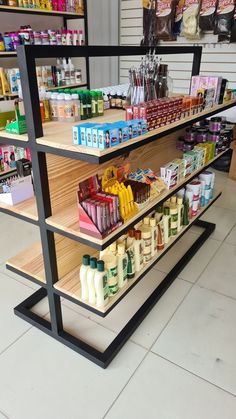 the shelves are filled with different types of food and condiments for sale in a grocery store