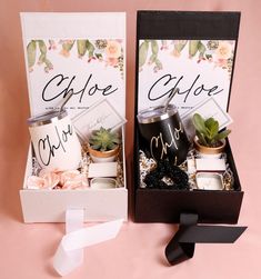 two gift boxes with coffee and succulents in them on a pink background