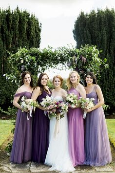 a group of women standing next to each other