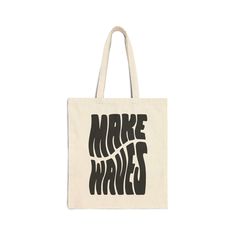 This Make Waves Canvas Tote Bag is the perfect accessory for any beach day or casual outing. Made of durable canvas material, it features a stylish "Make Waves" design that will make a statement. With plenty of room for all your essentials, this tote bag is both functional and trendy. - Tote size: 15in x 16in- 100 % organic cotton- Twin carry handles (20in long)- Flat corners- Double Side Design Trendy Canvas Tote Beach Bag, Trendy Canvas Beach Shoulder Bag, Travel Cotton Tote Beach Bag, Cotton Tote Shoulder Bag For Beach Season, Cotton Shoulder Bag For Daily Use At Beach Season, Trendy Canvas Beach Bag For Everyday Use, Trendy Canvas Vacation Bag, Cotton Canvas Bag For Daily Use And Beach Season, Cotton Beach Bags For Daily Use