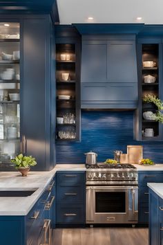 Navy blue kitchen with white marble counter tops and gold accents in the kitchen Navy Cabinets, Dish Display, White Dish