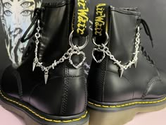 Welcome to this listing for our awesome O ring barbed wire boot chains! - Stainless steel chain with barbed wire charms - O ring attachment with barbed wire heart pendant - Alt studs on chain - Photographed on UK size 6 Dr Marten 1460 to give you and idea how they will look on your boots! - These can also be used as a super cool bag or jeans chain. - Choose between 1 boot chain or 2 boot chains (pair) These would make a fabulous gift for someone who loves their Dr Martens or a cheeky treat for y Belt Loop Chain, Punk Boots Diy, Boots With Chains, Shoe Chains, Mean Girls Costume, Wire Charms, Barbed Wire Heart, Boot Charms, Punk Fashion Diy