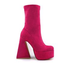 Vegan suede upper with man made sole Side zipper closure Heel measures approx. 5.5" H Platform measures approx. 2" H Imported