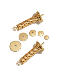 brass plated coils and washers on a white background