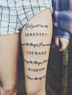 a woman's legs with words written on them and the word serenity in cursive writing