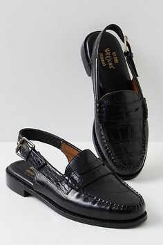 Put some prep in your step with this edgy take on classic penny loafers, featured in a so cool croc leather fabrication and unique slingback silhouette with adjustable buckle strap for a simple added edge to any look.* Sling-back design* Adjustable buckle strap* Slight heel