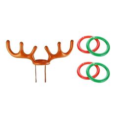 three deer antlers with green and red rings in front of white background for decoration