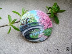 a painted rock sitting on top of a table