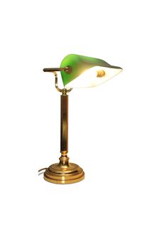 a green and white lamp sitting on top of a table