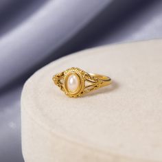 Our Vintage Royal Pearl Ring is a vintage-inspired dream come true. Crafted with stunning freshwater pearl, this beautiful piece is guaranteed to be a wardrobe essential for years to come. Pearl Rings Vintage, Pearl Rings, Cute Engagement Rings, Gold Pearl Ring, Gold Rings Fashion, Jewelry Beautiful, Jewelry Lookbook, Jewelry Ring Box, Earrings Dangle