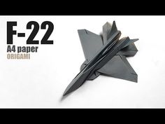 an origami fighter jet is shown with the text f - 22