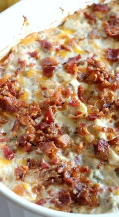 a casserole dish with bacon and cheese