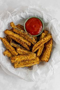 fried french fries with ketchup on the side